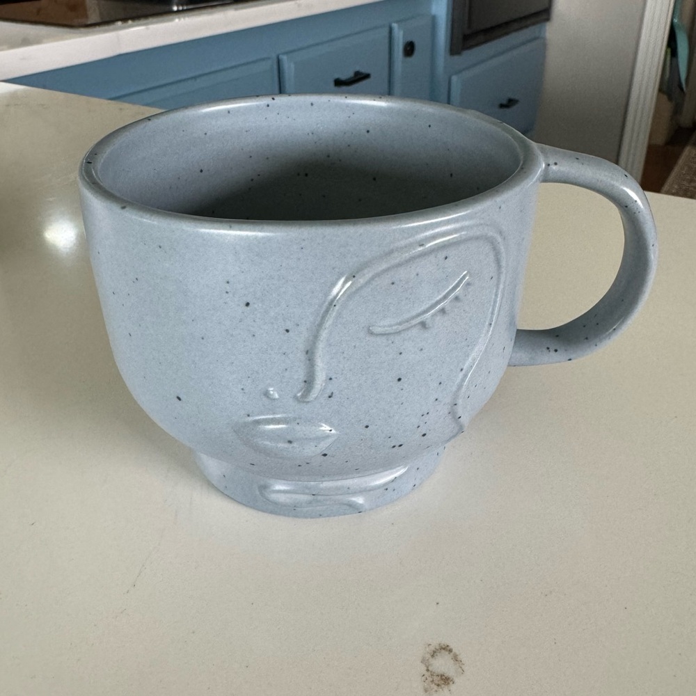 Blue Face Anthropologie coffee mug